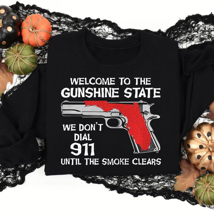 Welcome To The Gunshine State We Don't Dial 911 Until The Smoke Clears t-shirt