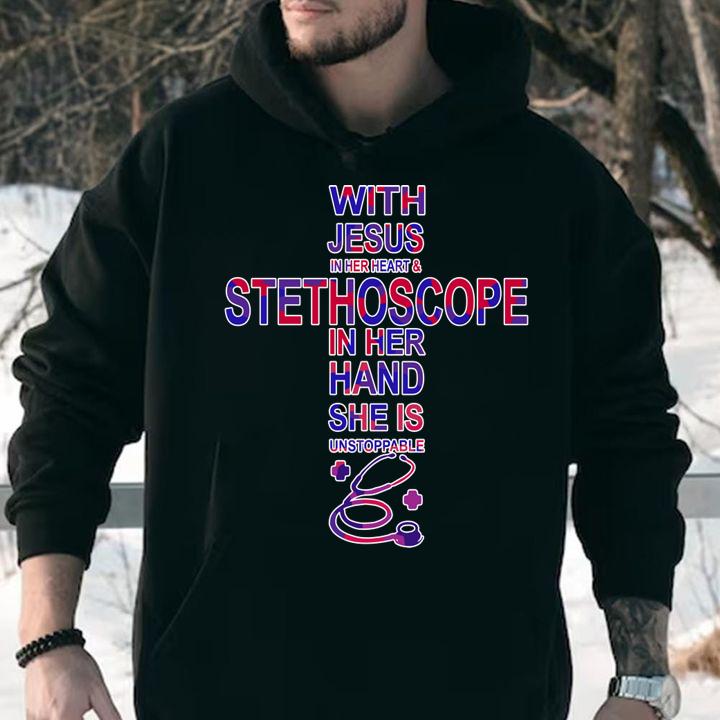 With Jesus in her heart and stethoscope in her hand she is unstoppable t-shirt